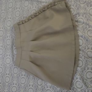 Tan mini skirt